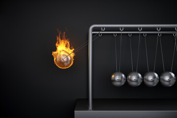 Newton's pendulum with one burning ball