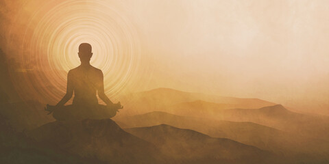 practices yoga and meditating on the mountain sunset background