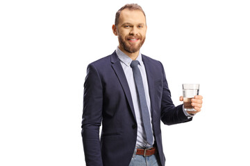 Young professional man holding a glass of water