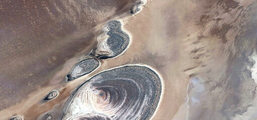 petrified UFOs, abstract photography of the deserts of Africa from the air. aerial view of desert...