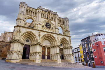 Fototapeta na wymiar Gothic cathedral of Cuenca with its impressive old stone facade, Spain.