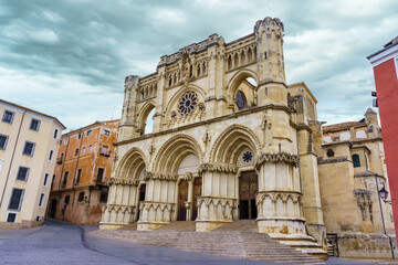 Fototapeta na wymiar Facade of the medieval cathedral of Cuenca in a cloudy and cold day, Spain.