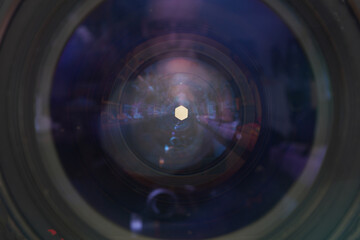 Clean and disassemble the lens for photography into its component parts