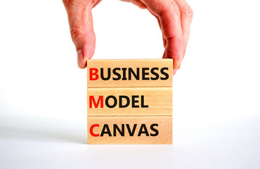 BMC business model canvas symbol. Concept words BMC business model canvas on blocks on a beautiful...