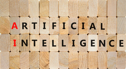 AI artificial intelligence symbol. Concept words AI artificial intelligence on wooden blocks on a beautiful wooden background. Business AI artificial intelligence concept. Copy space.