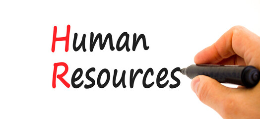 HR Human resources symbol. Concept words HR Human resources on white paper. Businessman hand with marker. Beautiful white background. Business and HR human resources concept.