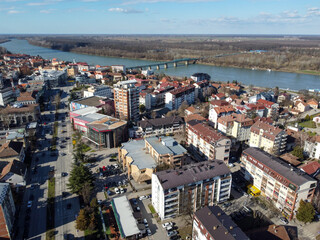Fototapeta na wymiar Aerial drone view of Brcko. Brčko is a town in northern Bosnia and Herzegovina. River Sava. Buildings, streets and houses. 