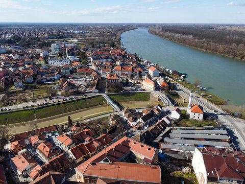 Fototapeta Aerial drone view of Brcko. Brčko is a town in northern Bosnia and Herzegovina. River Sava. Buildings, streets and houses. 