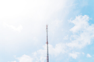 Telecommunication mast TV antennas in the afternoon ,on the hill blue sky with cloud bright at Phuket Thailand.