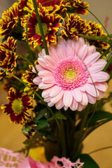 Bouquet with fern and pink gerbera.
