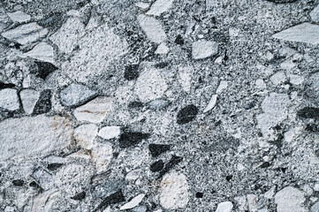 Dark grey sand stone textured abstract backdrop