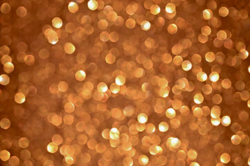 Trendy gold blurred sparkling background with bokeh