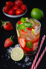 Strawberry mojito. Refreshing summer drink with berries, lime and mint