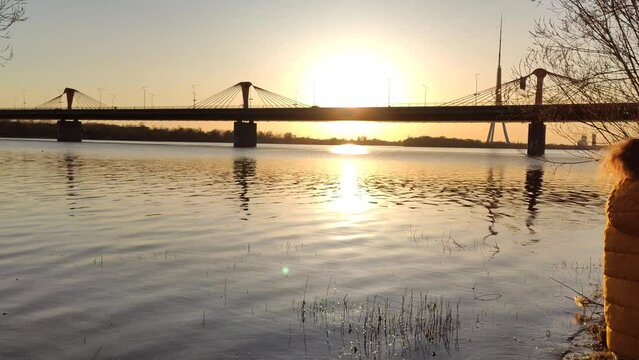 Sunset over the bridge. Riga, Latvia, East Europe. 