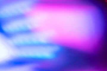 Blur led light. Fluorescent background. Ultraviolet radiance. Defocused neon blue pink purple color...