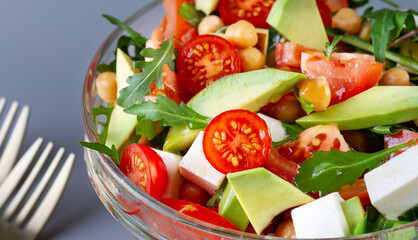 Vegetable salad with tomato and avocado