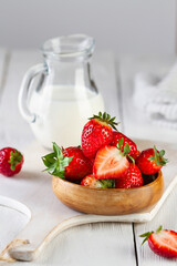 Strawberries with milk on the table