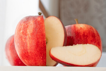 still life of several apples, one of them notched