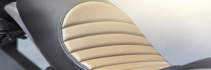 Beautiful brown-black seat and light to the side.