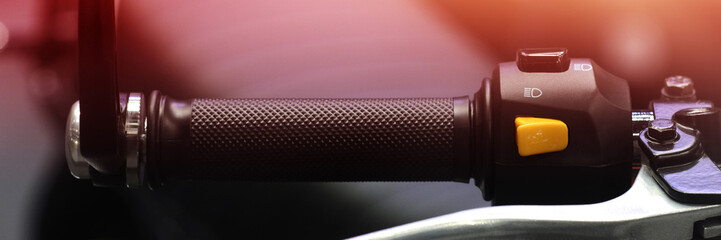 Motorcycle accelerator handle. Racers twist the throttle to increase their speed in the world...