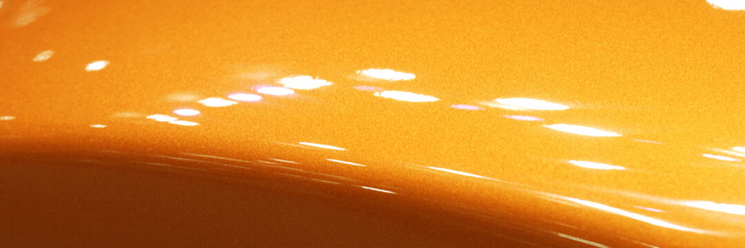 Reflection of the front bonnet of supercar.