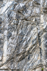 Marble surface with veins and a beautiful pattern on an industrial quarry. Karelia. Russia