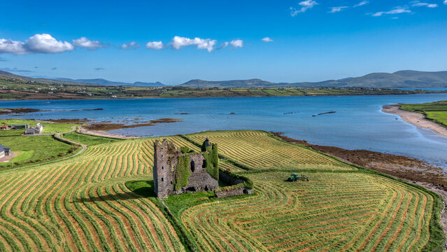 Aerial view at Cahersiveen Ballycarbery Castle in County Kerry Ireland Wild Atlantic Way seen by drone