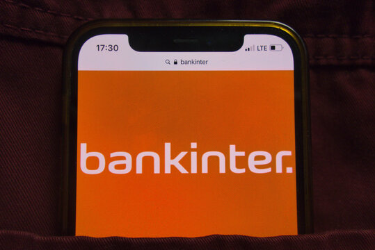 KONSKIE, POLAND - February 22, 2022: Bankinter SA logo on mobile phone hidden in jeans pocket