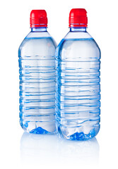 Two plastic bottles of drinking water isolated on white background