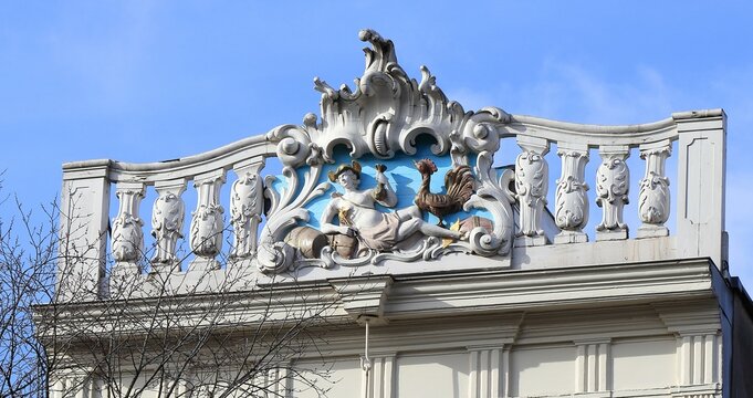 Amsterdam Canal House Roof Close Up with Sculpted Detail Depicting Mercurius, Netherlands
