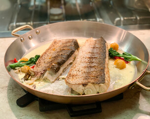 Baked white fish fillet with sauce