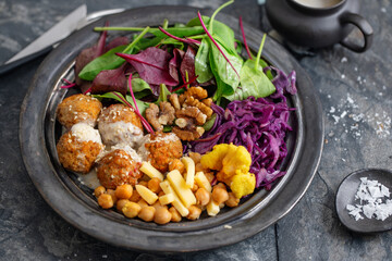 Tasty vegan salad with falafel and chickpea