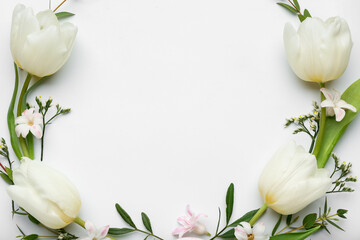 Stylish Easter wreath with tulip flowers on light background