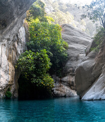 Fototapeta na wymiar natural rocky canyon with blue water in Göynük, Turkey