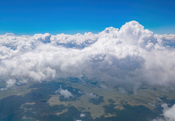 Aerial view of mountain landscape, view from window seat in an airplane