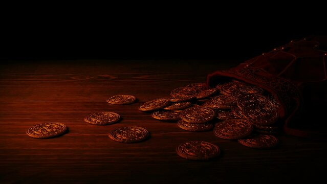 Passing Bag Of Gold Coins In Firelight Medieval Scene