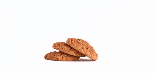 Three Oatmeal cookies isolated on white background. 