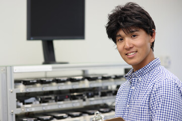 Asian businessman checking a products