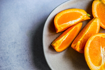 Slices of ripe orange fruits