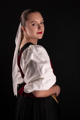 Young beautiful slovak woman in traditional dress. Slovak folklore