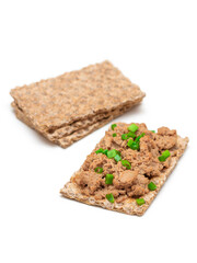 Crispy Sandwich with Chicken Pate and Green Onions Isolated on White Background - Top View. Whole Grain Bread with Liver Pate. Diet Breakfast and Healthy Food