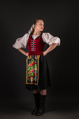 Young beautiful slovak woman in traditional dress. Slovak folklore