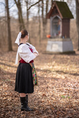 Young beautiful slovak woman in traditional dress. Slovak folklore