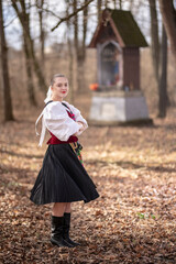 Young beautiful slovak woman in traditional dress. Slovak folklore