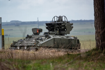 British Army Alvis Stormer Starstreak CVR-T tracked armoured vehicle equipped with short range air defense high-velocity missile system in action on a military exercise, Wiltshire UK