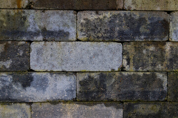 gray and damp masonry stones