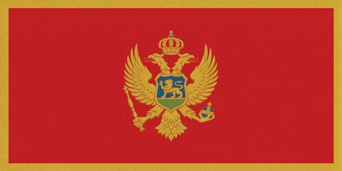 Flag of Montenegro. Montenegro flag on fabric surface. Fabric texture