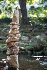 balanced stones by a creek in Korea 