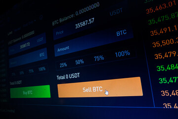 Computer screen with the mouse cursor on the Sell Bitcoin button