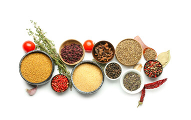 Set of different spices and herbs on white background